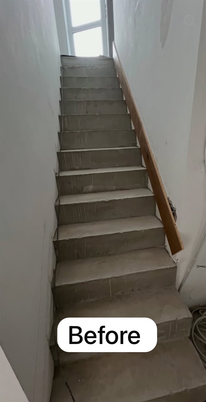 Staircase before — bare concrete steps with no finish